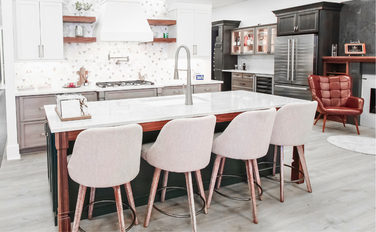 White countertops in a kitchen with white cabinetry