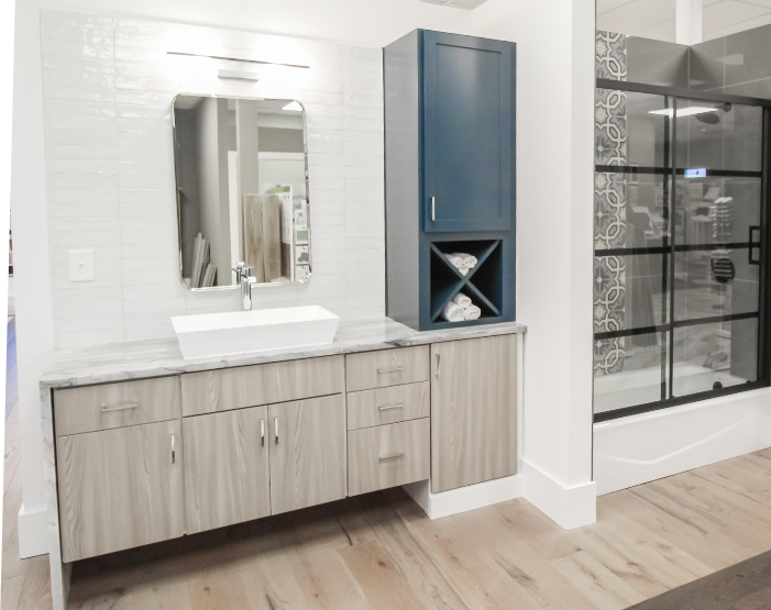 light wooden vanity cabinets in a bathroom display