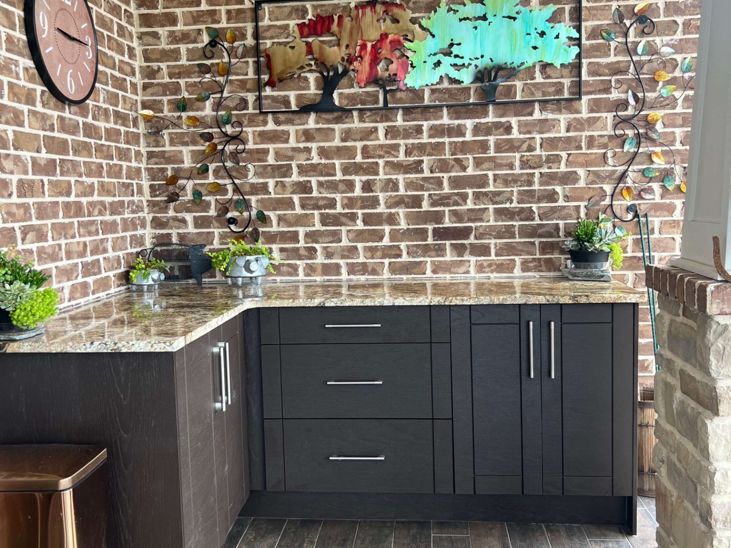 beige countertop installation with brick backsplash in Nashville