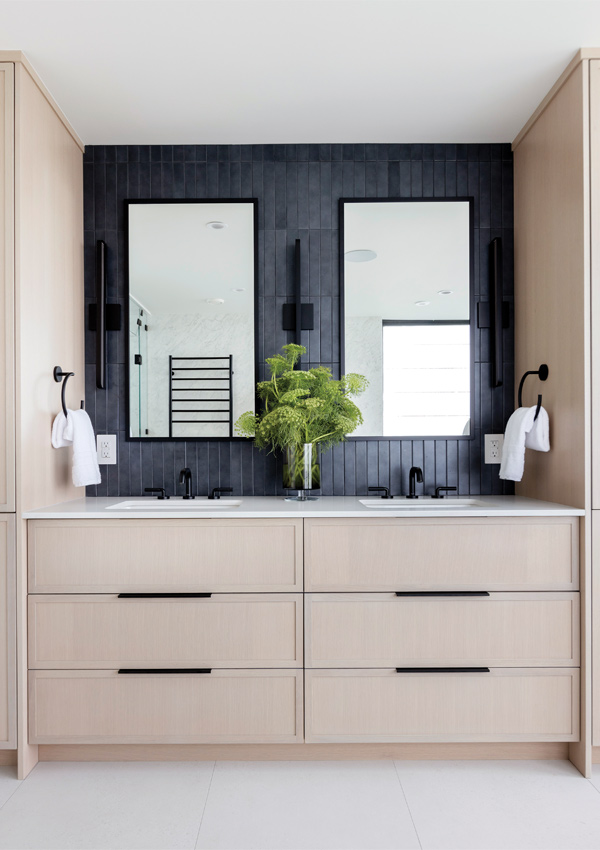 bathroom vanity with tile backsplash. Design by Knight Varga Interiors | Photography by Janis Nicolay